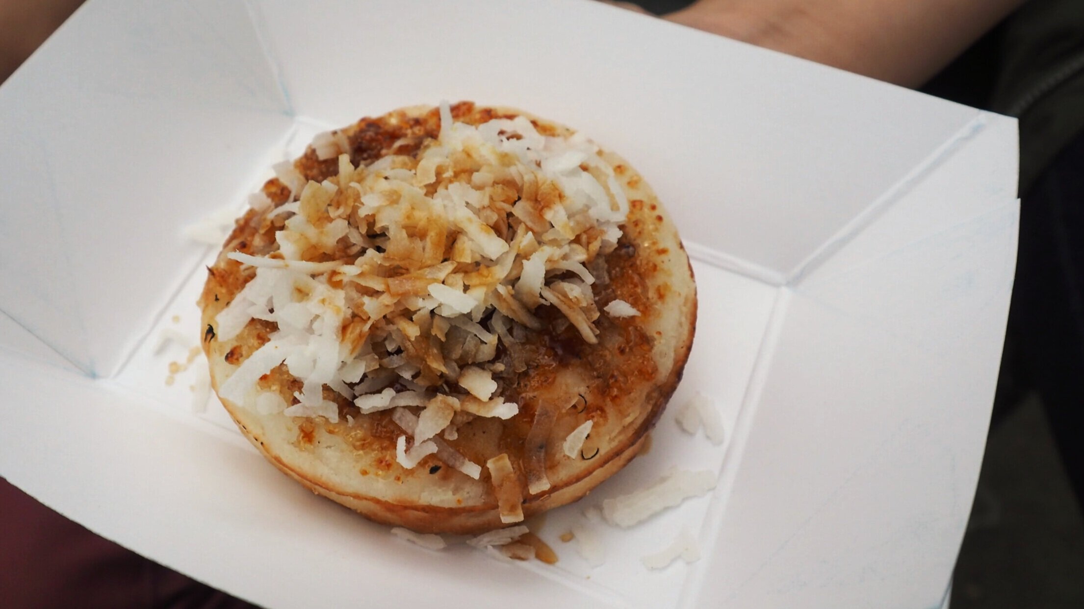 Moon Man’s Kue Pancong- Indonesian coconut pancake topped with coconut, chocolate, peanuts, and Java palm sugar